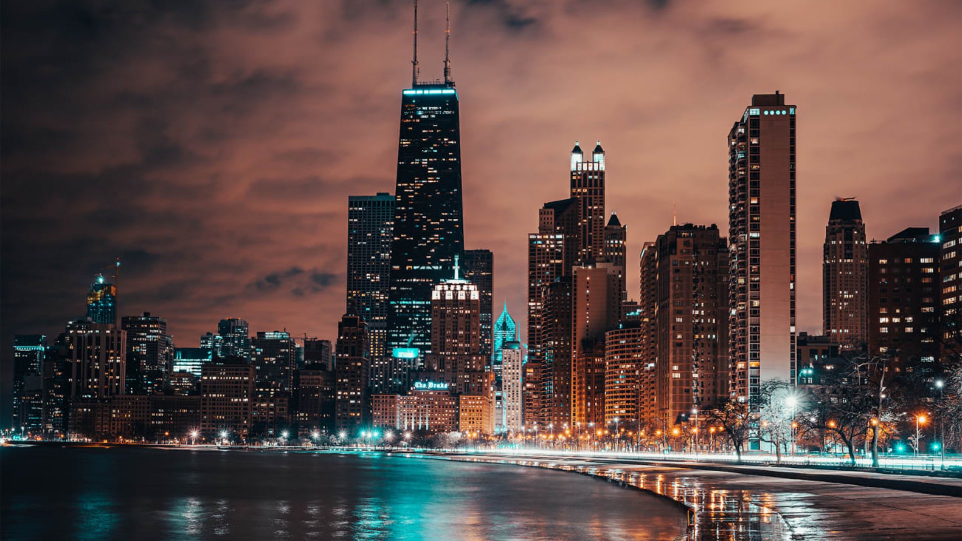 Downtown Chicago skyline over the river - O'Hare car service to the Loop and the Magnificent Mile