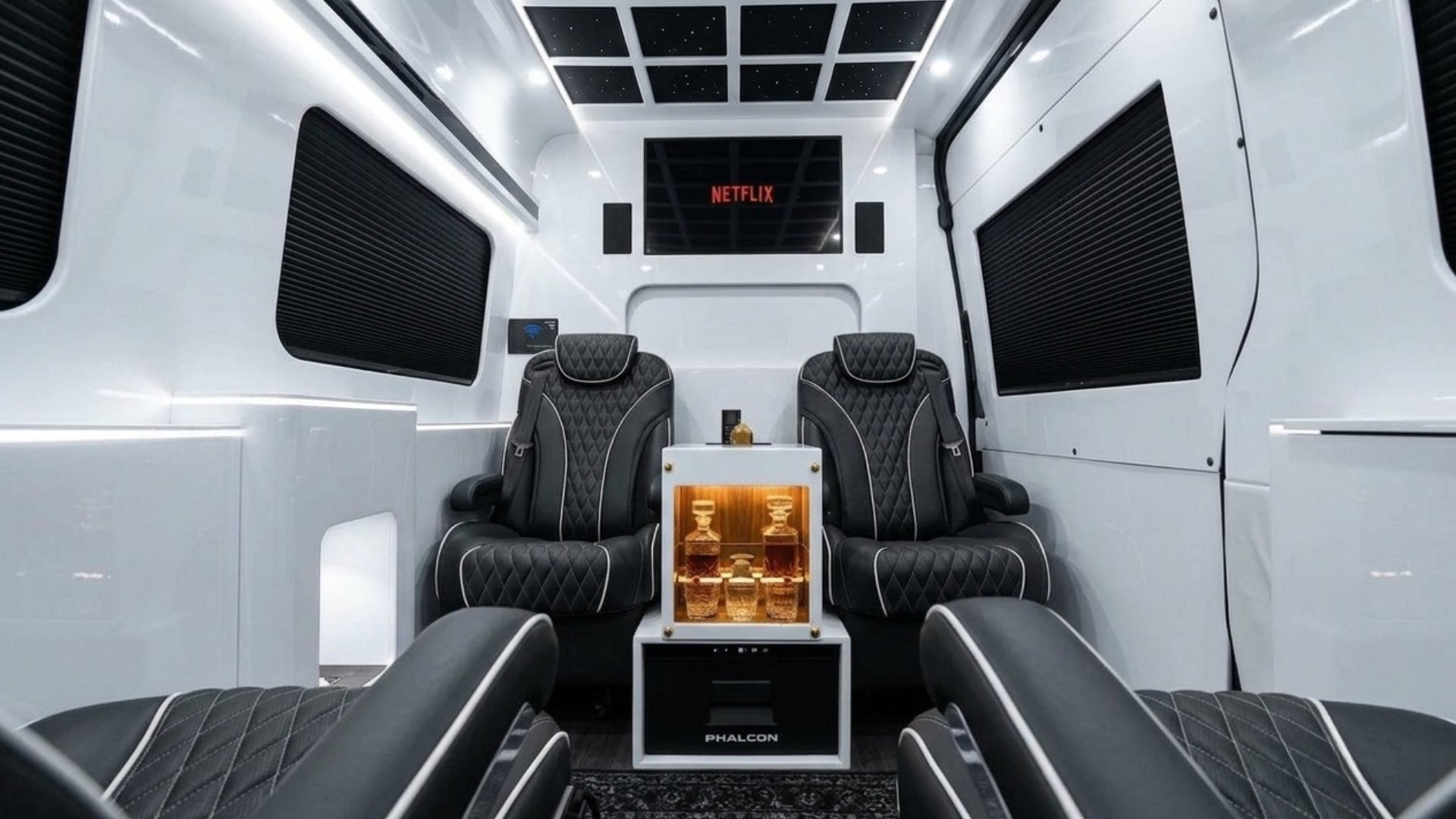 Jet-style Sprinter interior - reclining captain's chairs