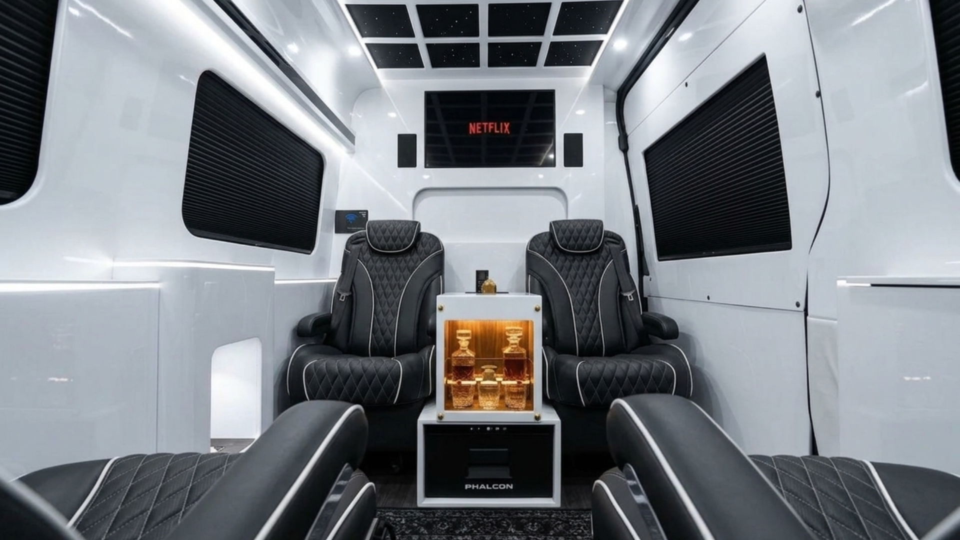 Jet-style Sprinter interior — reclining captain's chairs