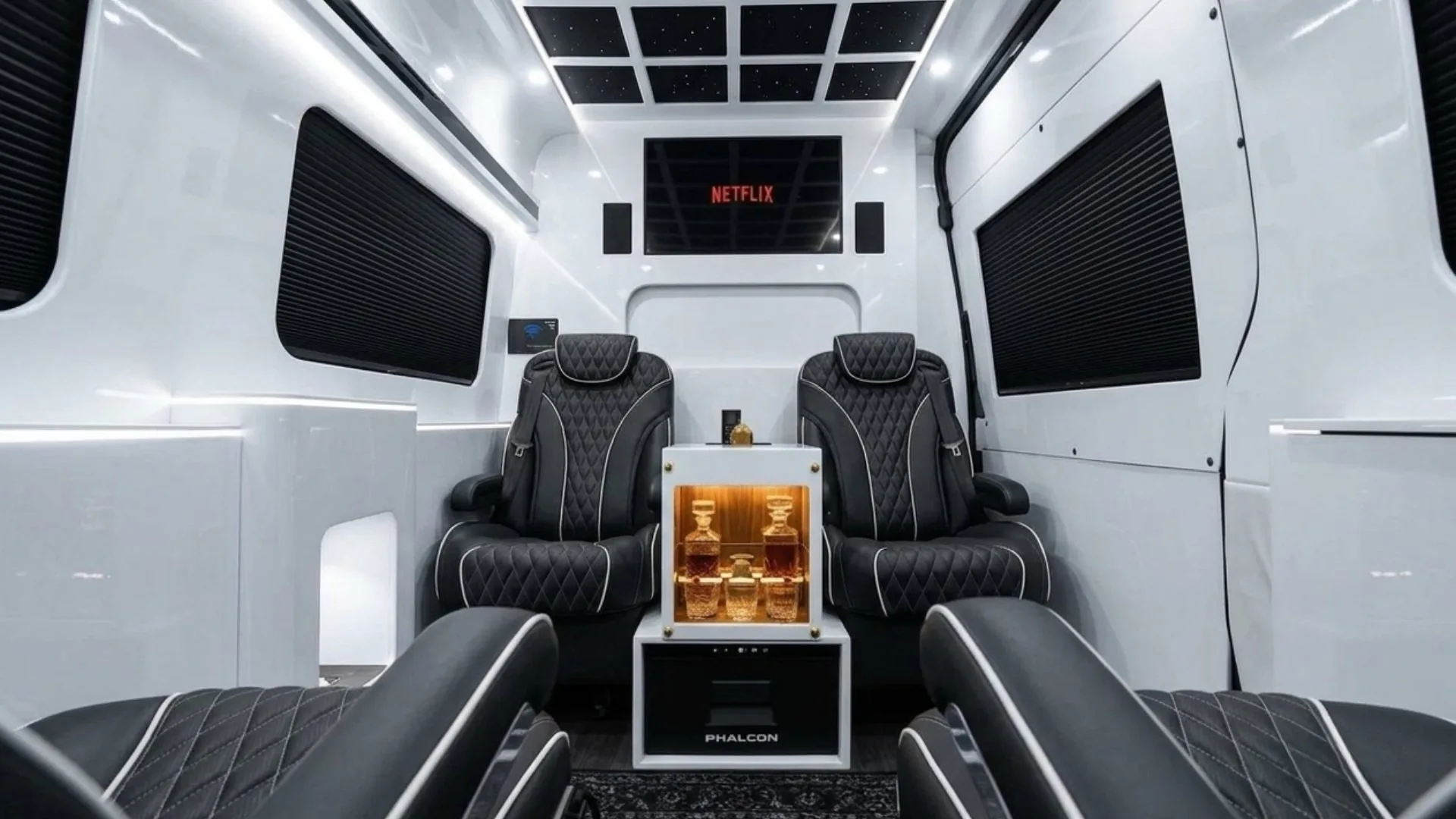 Jet-style Sprinter interior - reclining captain's chairs
